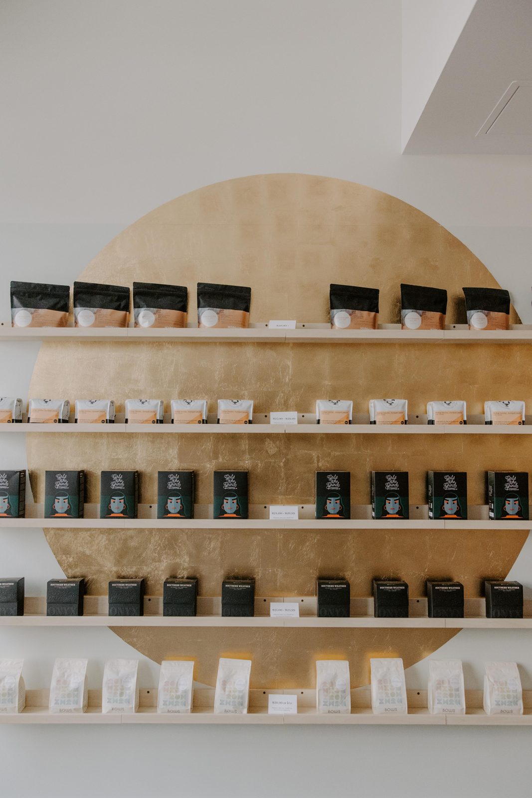 Coffee jars on the gold shelf